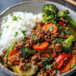 Spicy Ground Beef Stir-Fry Bowl with Garlic Veggies and Steamy Rice