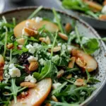 Arugula Salad with Pears, Almonds, Goat Cheese, and Dried Apricots